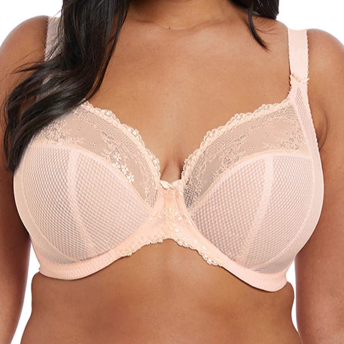 Woman wearing the comfortable Elomi Charley bra in a plunge style. Color Soft Pink. Style # EL4382.