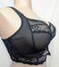 Black Elomi Charley longline lace bra on a mannequin against a white background. Style EL4381. Side view.