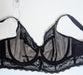 Black Elomi Charley longline lace bra on a mannequin against a white background. Style EL4381. Inside view.