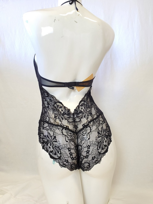 An amazing bodysuit by Lise charmel, Ecrin Desir with vibrant embroidery and delicate lace. Color Black. Style ALG5215.