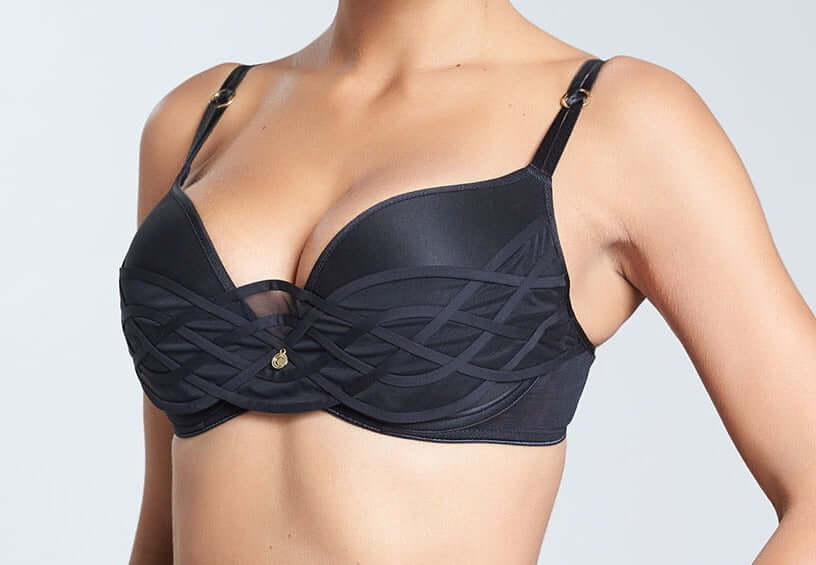 An amazing pushup bra, Chantelle, Babylone, with a deep plunge and a bondage inspired design. Color black. Style 6452.