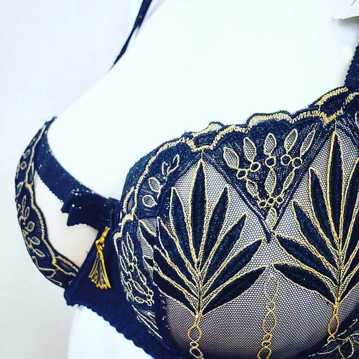 An Aubade fashion bra, Reve a Louxor, a demi bra in black with gold mesh and trim. Color Black. Style Y414.