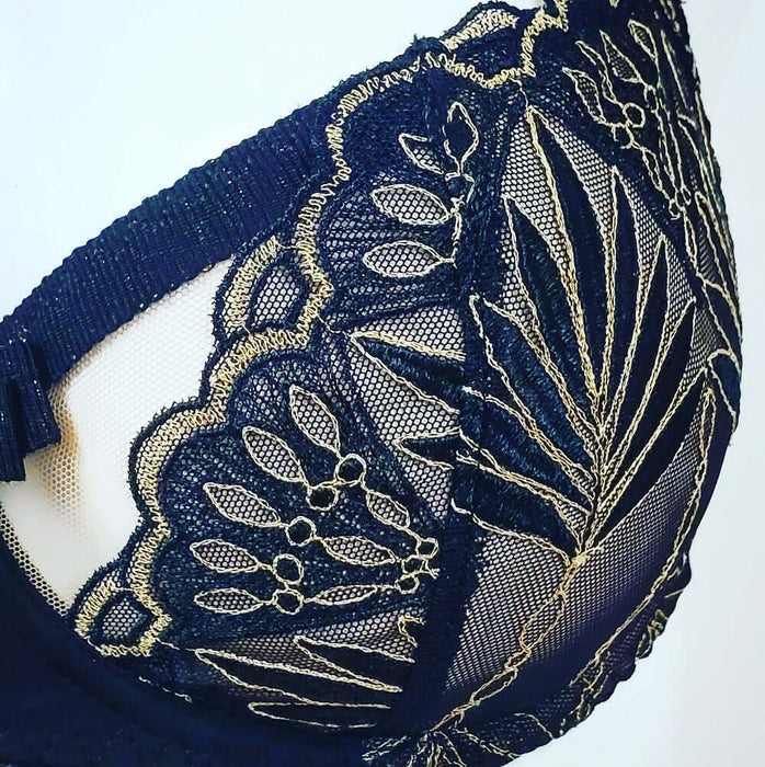An Aubade fashion bra, Reve a Louxor, a demi bra in black with gold mesh and trim. Color Black. Style Y414.