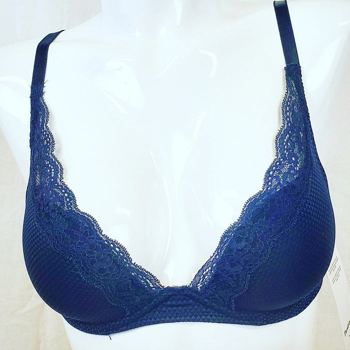 A beautiful plunge Chantelle bra from their Passionata line. Brooklyn, in a rich color with a deep plunge. Color Night Blue. Style 5701.
