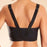 A wireless, compression, sports bra from Chantelle at a low price. Sizing is Small, Medium, Large. Color black. Style 2946.
