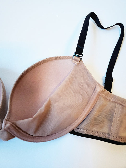 Little Bra Company bra, Little Julia. A best seller because she does so much. A demi cut bra. A tshirt bra. A pushup bra with removable foam padding. Color Beige. Style F008.