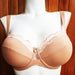 Zoe by Marie Jo. An underwire bra with padded cups and transversal seaming for shape. Sides and back are a breathable mesh with sewn-on elastic at the edges for a better fit. Style 0101595.