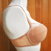 Zoe by Marie Jo. An underwire bra with padded cups and transversal seaming for shape. Sides and back are a breathable mesh with sewn-on elastic at the edges for a better fit. Style 0101595.