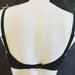  A deep plunge bra by Prima Donna. A satin black finish makes this contemporary bra ideal for the firmer breast. Style 0161334.