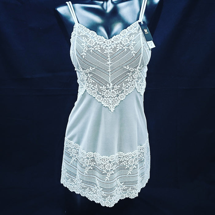 A great Wacoal chemise, Lace Embrace, is soft and versatile. Use her for bed, layering or just hanging around. Mesh body with lace trim. Color white. Style 814191.