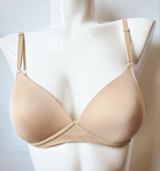 Wacoal bra, this petite, wireless, softcup bra with contour cups is all comfort and support. Color Beige. Style 75305.