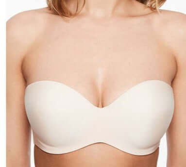 A premium Chantelle strapless bra, Absolute, is smooth and sleek. A tshirt bra with light foam padding. Wear the straps halter, criss cross, traditional, or strapless. Color beige. Style 2925.
